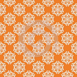 White floral seamless pattern on orange background