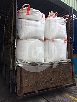 White flour bag arranged in a raw material warehouse