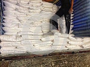 White flour bag arranged in a raw material warehouse