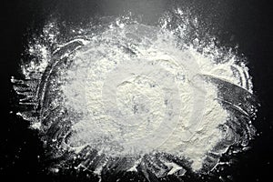 White flour on black background