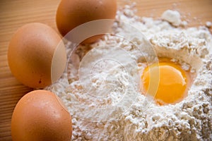 White flour and eggs on the table