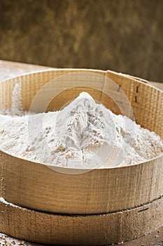 White flour on a sieve