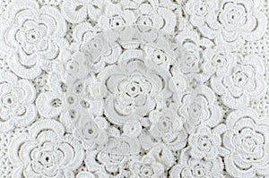 White flowers crocheted of wool