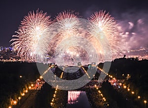 White flowers of fire explosions during the International Moscow Firework Festival