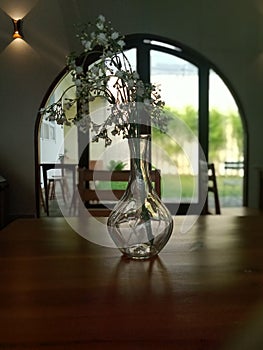 White flowers on a transparant vase