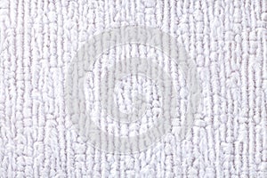 White fluffy background of soft, fleecy cloth. Texture of textile closeup