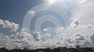 White fluffy clouds and blue sky