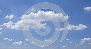 White fluffy clouds and blue sky