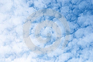 White fluffy clouds in blue sky, altocumulus fluffy clouds background photo