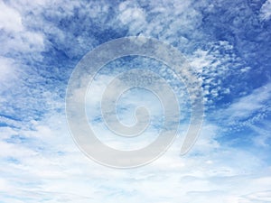 white fluffy clouds on blue sky in summer on sunny day