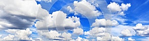 White fluffy clouds clear blue sky background panorama, cumulus cloud texture, cloudy azure skies backdrop, beautiful cloudscape