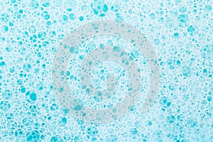 white foam bubbles.Cleanliness and hygiene background. Foam Water Soap Suds.Texture Foam Close-up. blue soap bubbles