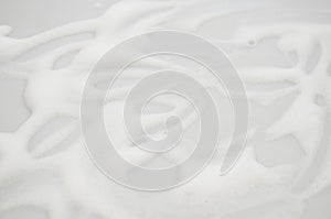 White foam bubbles texture. Shaving cream.