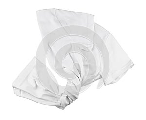 White folded t-shirt isolated on white. Flat lay