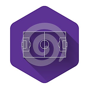 White Football field or soccer field icon isolated with long shadow. Purple hexagon button