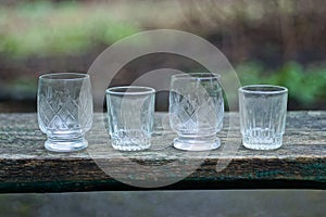 white four small glass crystal goblets