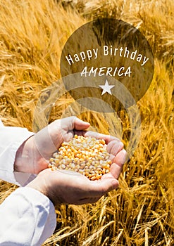 White fourth of July graphic in circle against cornfield and hands filled with corn