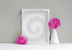 White frame mock-up, empty layout, vase with pink aster