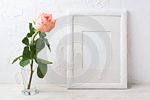 White frame mockup with creamy pink rose in glass vase