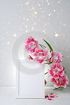 White frame mockup with flowers. Poster product design styled
