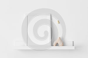 White frame mockup with a lagurus decoration on the wall shelf