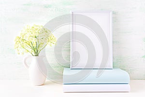 White frame mockup with pale mint book