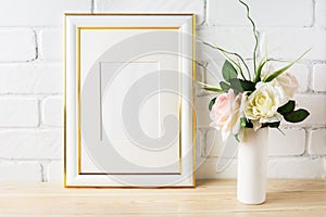 White frame mockup with pale pink roses in vase