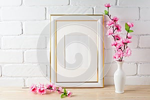 White frame mockup with pink flower bunch