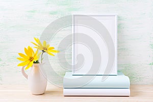 White frame mockup with two deep yellow rosinweed and books
