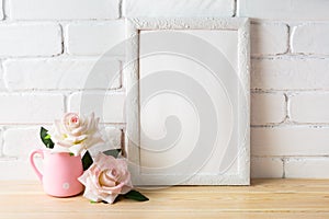 White frame mockup with two pale pink roses