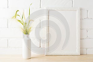 White frame mockup with yellow and green wild grass ears