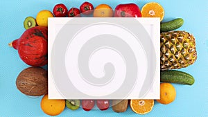 White frame with place for text and tropic fruits move on blue theme. Stop motion