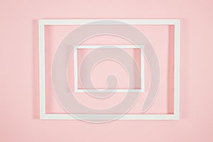 White frames on pink background and some shadows