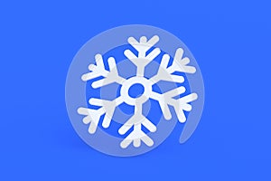 White frozen snowflake on blue background. Large snowfalls in winter