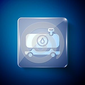White Fuel tanker truck icon isolated on blue background. Gasoline tanker. Square glass panels. Vector