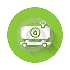 White Fuel tanker truck icon isolated with long shadow. Gasoline tanker. Green circle button. Vector