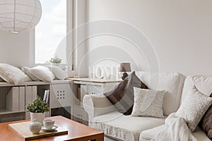 White furniture in contemporary lounge