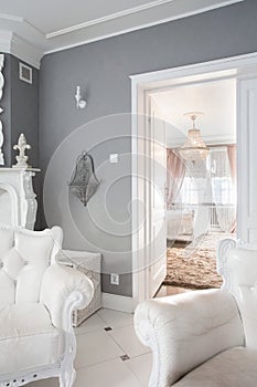 White furniture inside expensive house