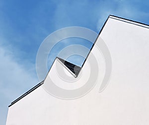 White Gable In Front Of Blue Sky