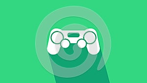 White Gamepad icon isolated on green background. Game controller. 4K Video motion graphic animation