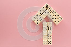 White gaming dices on pink background. victory chance, lucky. pointer. Flat lay, place for text. Top view. Close-up. Concept