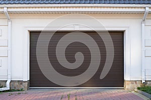 White garage and automatic brown garage door