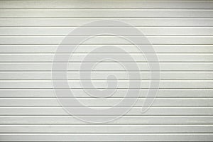 White garage door texture. Perforated metal garage door