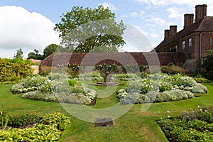 White garden Barrington Court near Ilminster Somerset England uk with gardens in summer sunshine
