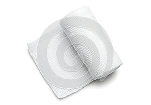 Rolled white gauze bandage on white background medical