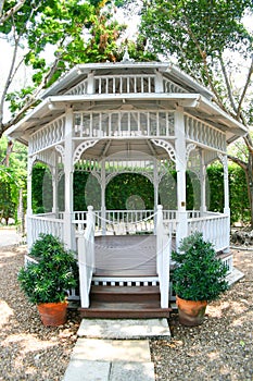 White gazebo in natural park