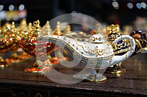 White genie oil lamp that relates to ancient myth and legends