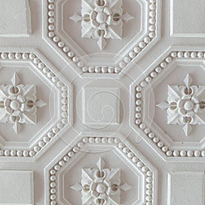 White geometric ornamental pattern of ceiling for background, square