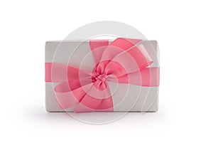 White gift box with pink ribbon bow isolated on white background