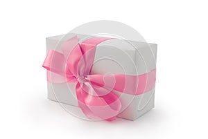 White gift box with pink ribbon bow isolated on white background